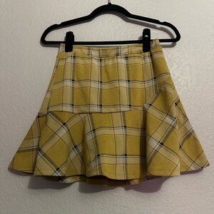 Yellow and black plaid mini skirt with shorts underneath size small